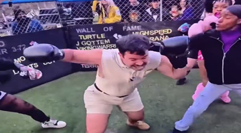 Viral Scrapyard Boxing Match Features Man Swarmed by Five Women