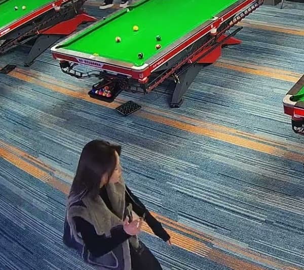 Pool Player's Wild Shot Hits Passing Woman, Sparks Safety Concerns
