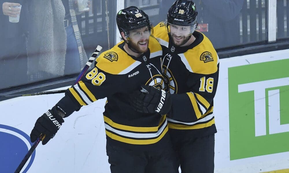 Bruins Face Setback as Pastrnak and Zacha Miss Game Against Rangers