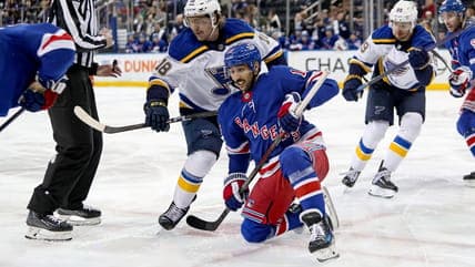 Rangers and Blues Battle Injuries in Crucial Match to End Losing Streak